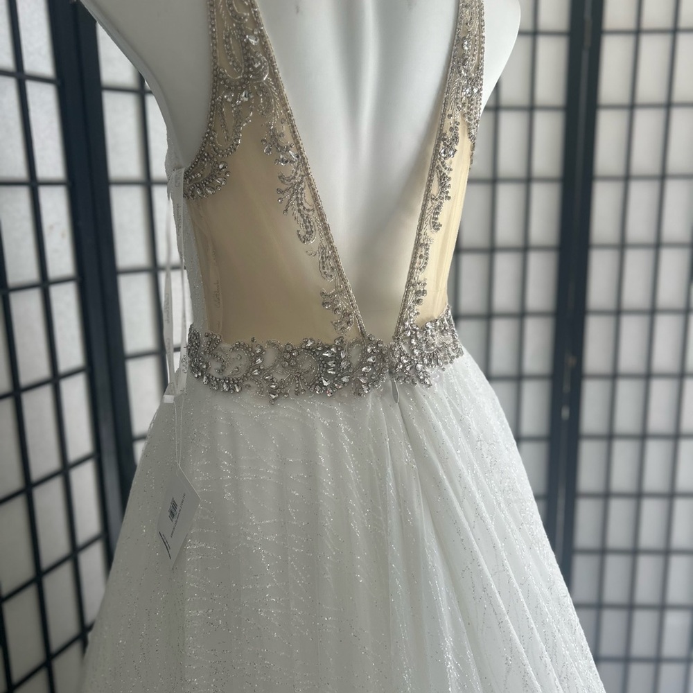 Elegant Glittery White Gown with Silver Accents - Picture 6 of 7